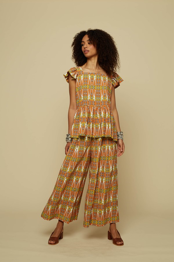 SCHEMA PANTS (BROWN GEO HUMAN FIGURE PRINT)